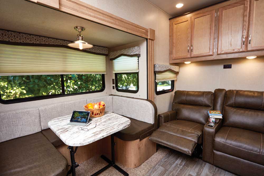 Photo of Winnebago Minnie Plus 29RBH fifth wheel trailer interior, dinette area