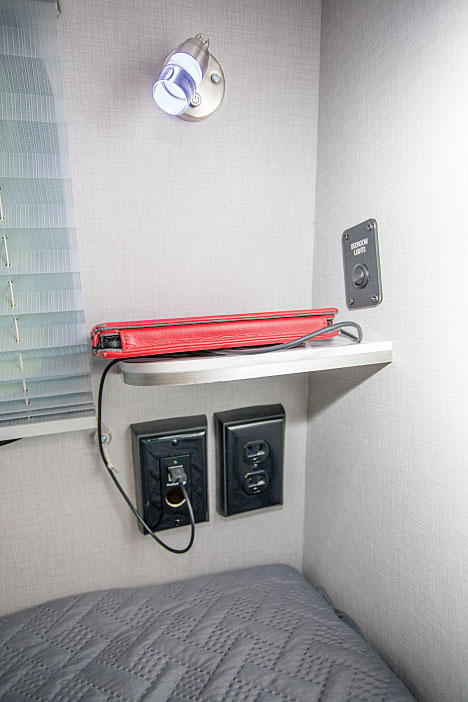 2020 inTech Sol Horizon shelf and outlets Bed with TV at end in inTech Sol Horizon trailer