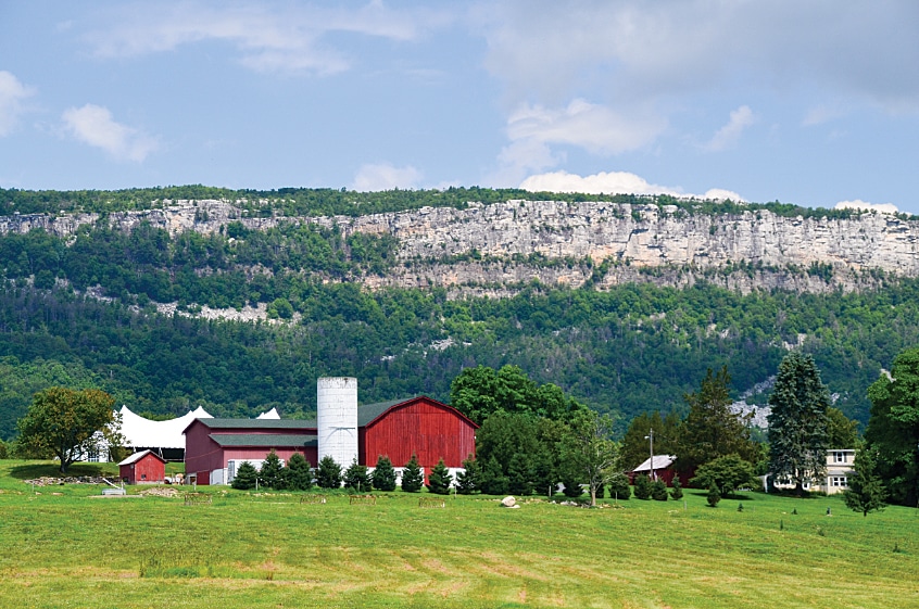 The Shawangunk Mountains rise up behind a Hudson River Valley farm.
