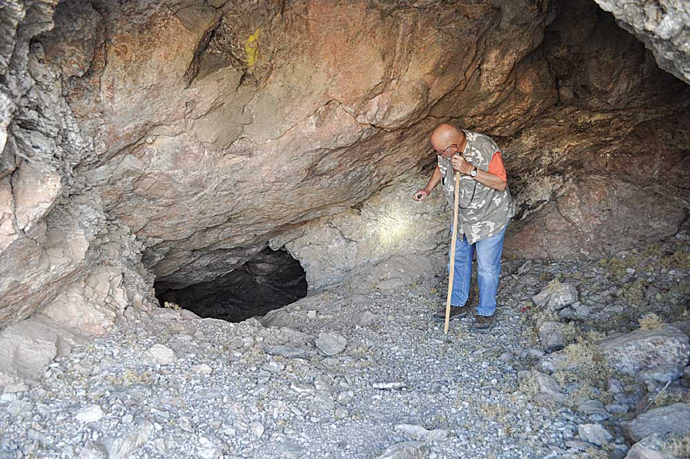 Bill Gelhaus explores an old abandoned mine in the Granite Wash Mountains near the town of Brenda. 