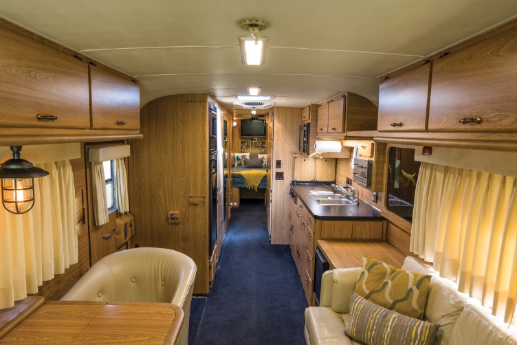 The retro colors, light fixtures and wood finishes give this Newell its vintage look.