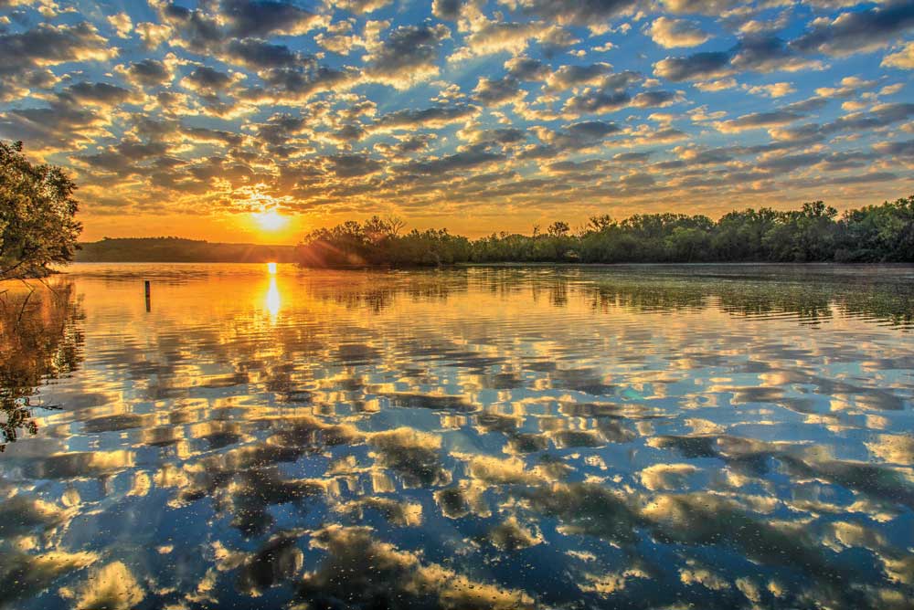 Sunrise reflected in lake surface