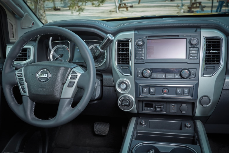 The Nissan Titan cockpit comes fully loaded and takes advantage of the latest electronics, including a backup camera for hitching the trailer.