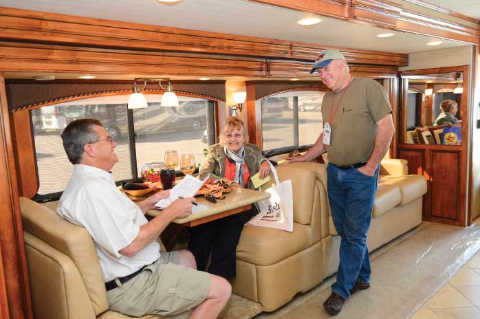 Don’t let other shoppers deter you from fully inspecting an RV. Sit on all the furniture, pretend to make a meal in the kitchen, stand in the shower and lie on the bed. Ask a sales rep to bring in the slides to see what the rig is like in travel mode. 