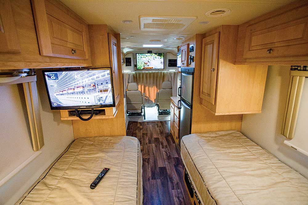 The optional 23-inch smart TV is available for those who prefer not to view the main TV, and is mounted on a swing-down bracket for comfortable viewing from the bed area.