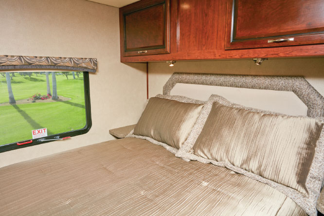 The queen pillowtop mattress is exceptionally comfortable and the cloth headboard is a good place to prop against to watch TV or read, though the reading lights get hot to the touch.