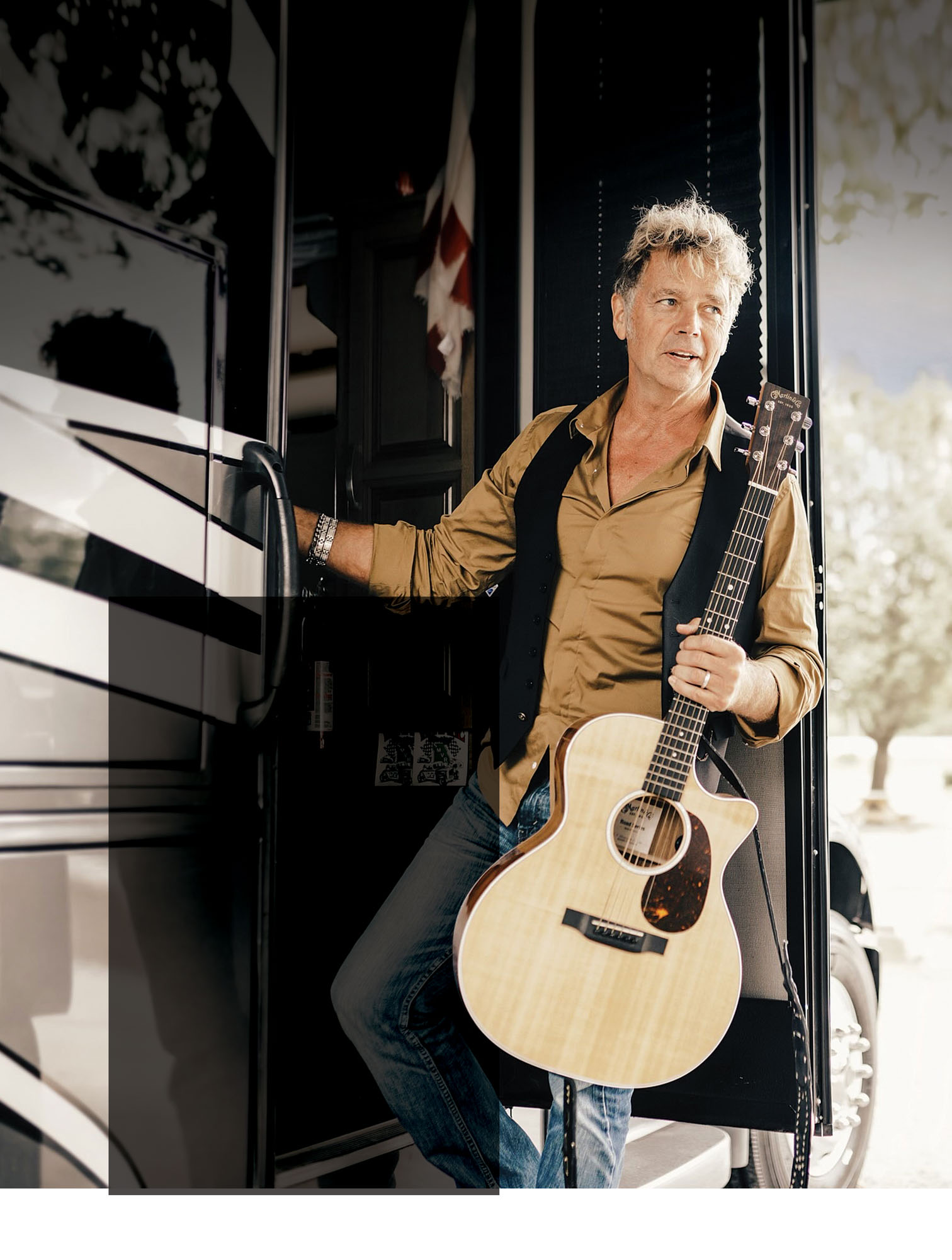 John Schneider and guitar