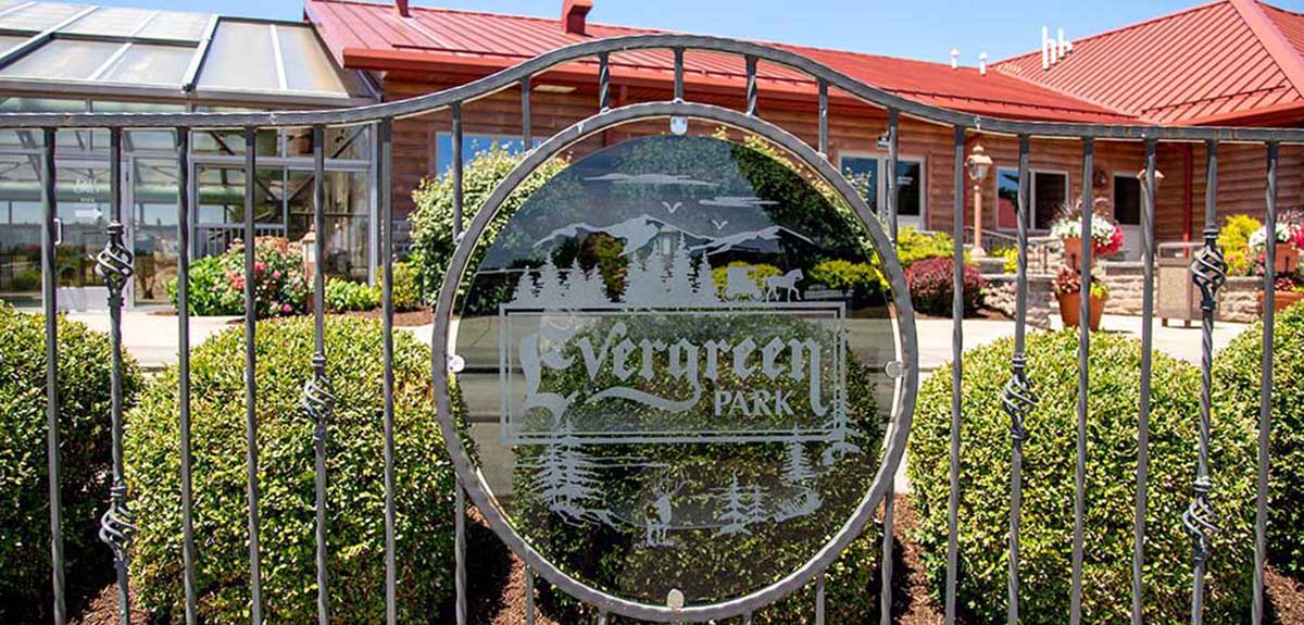 Sign proclaiming "Evergreen RV Resort"
