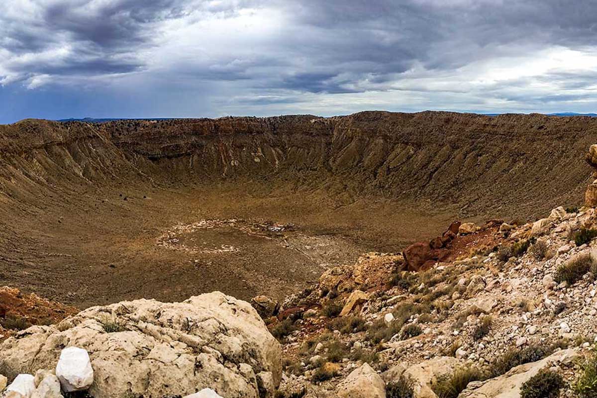 Meteor Crater — a deep depression in the desert floor.