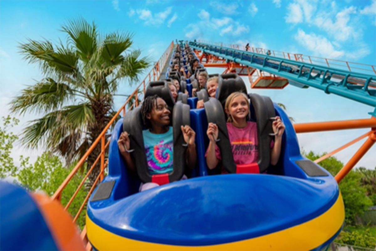 Family riding on a roller coaster