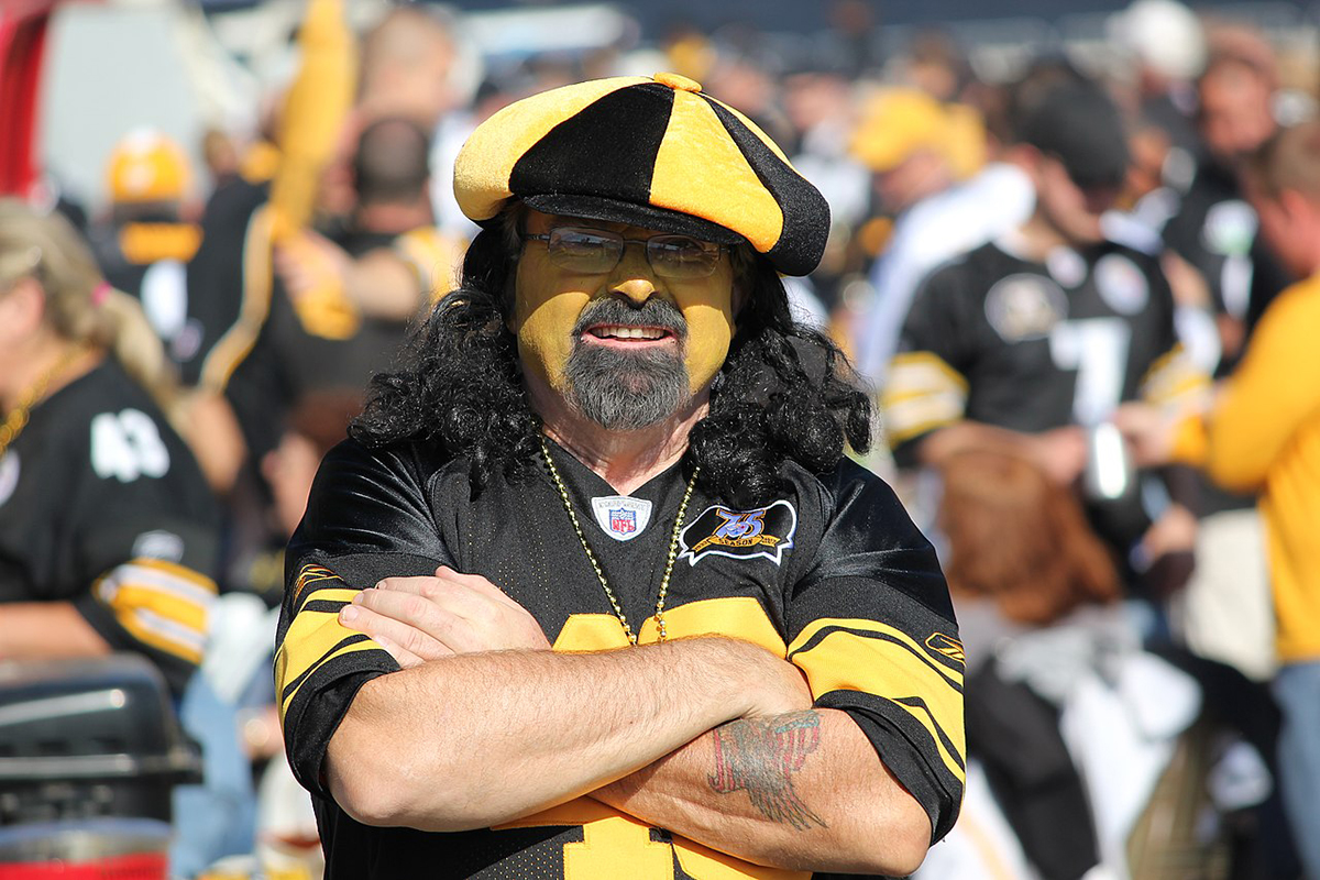 Man dressed in Steelers regalia.