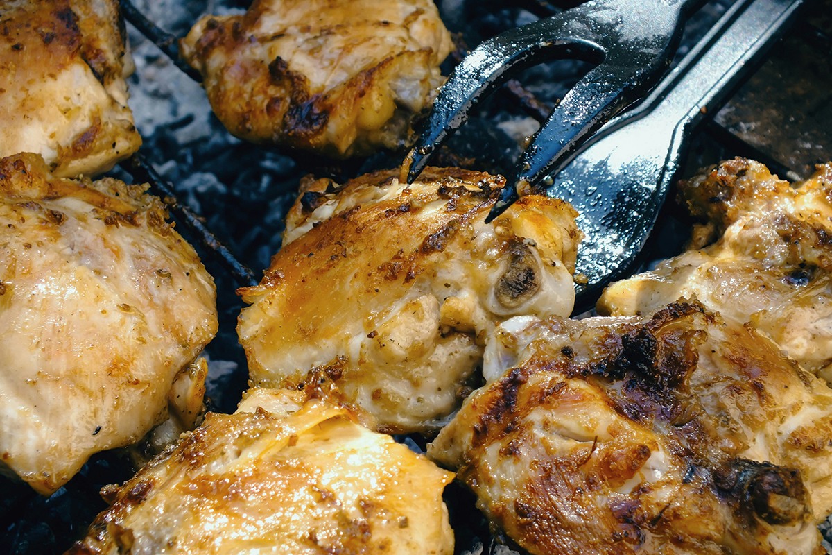 Grilled chicken on a barbecue.